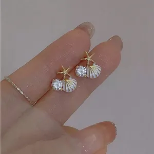Gold and White Starfish Shell Earrings thumbnail 6