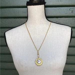 Gold toned locket Necklace with Floral Design thumbnail 1