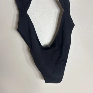 SKIMS Black cutout swimsuit monokini in color onyx size large beach boat resort thumbnail 10