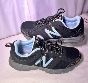 New Balance Black Sneakers with Light Blue Accents thumbnail 1