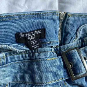 Petite Light Blue Wash Denim Buckle Detail Mini Skirt size 0 thumbnail 2