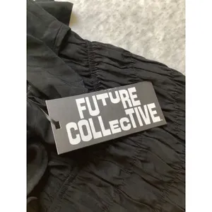 Future Collective Reese‎ Blutstein Black Smocked Ruffle Mini Dress NWT Womens L thumbnail 3
