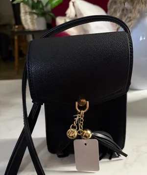 Black Faux Leather Crossbody Phone Bag with Tassel Charm thumbnail 1