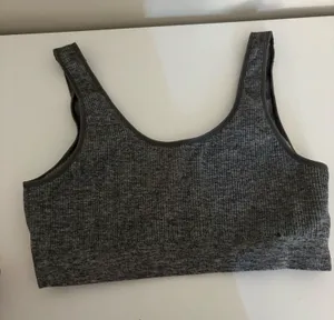 Gray ribbed cropped tank/sports bra with a comfortable, stretchy fit. G thumbnail 1