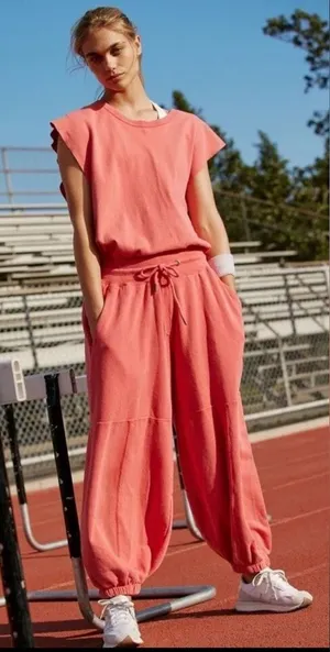 Free People movement Throw and Go Jumpsuit Dusty Pink /rasberry Size L thumbnail 1