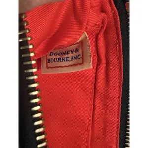 Y2K Dooney &‎ Bourke Wristlet Multicolor Circle Stamp Medallion Logo Design thumbnail 9