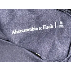 Abercrombie & Fitch Black Nylon Collared Asymmetric Long Sleeve Bodysuit Size M thumbnail 3