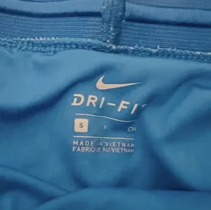 Nike Women's Dri-FIT Blue/ White "Run Fast" Wavy Abstract Print Running Shorts thumbnail 6