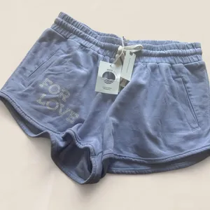 Anthropologie Daily Practice Violet Lounge Shorts Coastal Athleisure Size Medium thumbnail 1
