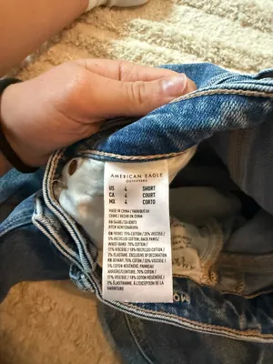 RIPPED AMERICAN EAGLE STRIGID BLUE JEANS thumbnail 6