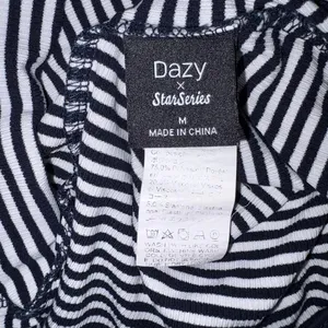 Dazy x StarSeries white & black horizontal striped top in size M. thumbnail 2