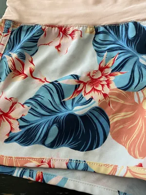 Roxy Pink and blue shorts, drawstring waist, excellent condition, size small Measurements: Waist: side to side 13-14 inches Rise: 9 inches Inseam: 2 inches thumbnail 4