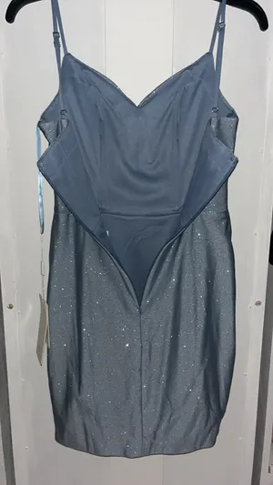 Stacees dusty blue, glittery, mid-length dress, with corset rib design, and knot design on chest, with bra padding built in. thumbnail 6