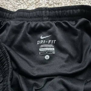 Nike Women's Black and White Athletic Shorts thumbnail 2
