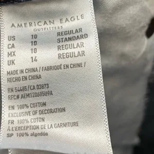 American Eagle hi-rise distressed, raw hem Girlfriend Jeans thumbnail 8