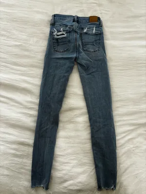American Eagle Outfitters Ripped Skinny Jeans in Dark Blue thumbnail 3