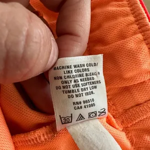 Under Armour women’s loose fit orange & pink athletic shorts large thumbnail 3