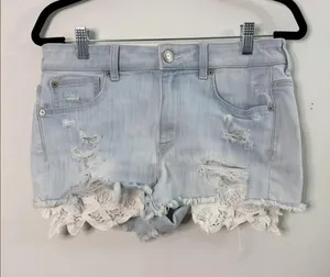 American Eagle Hi-Rise Shortie Denim Shorts Women’s Size 8 Light Wash Lace Hem thumbnail 1