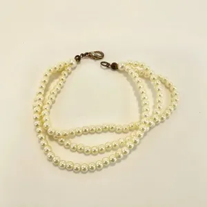 Triple strand faux pearl bracelet thumbnail 4