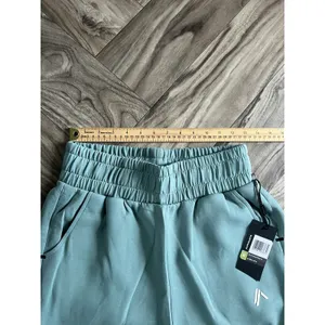 Set 2 Pcs Alphalete Women's ELMTS Short Sleeve Crop & Relaxed Coffed Jogger Teal thumbnail 8