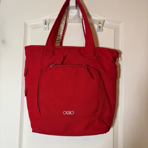 OGIO RED BAG WITH POLKA DOTS 14” X 14”. Preloved thumbnail 2