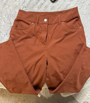 Lululemon City Sleek 5 Pocket Pant in "Dark Terracotta thumbnail 1