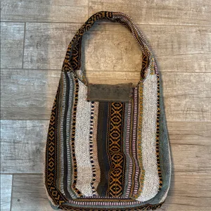 Bohemian Style Hobo Bag, Woven Pattern, Fringe Details And Slouchy Shoulder Strap thumbnail 3