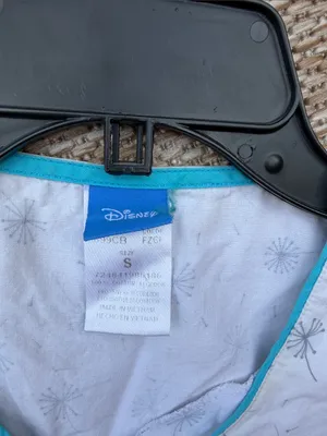 Disney White Short-Sleeve Scrub with Colorful Olaf Graphic thumbnail 2