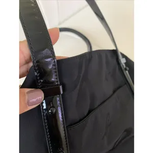 Agnès b. Voyage small black nylon bag with strap details. thumbnail 4
