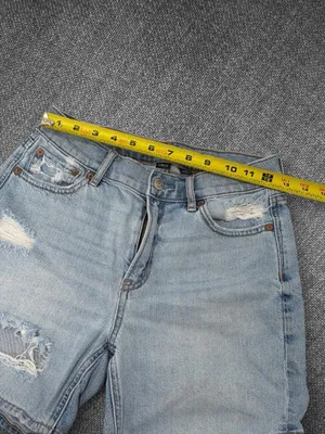 American Eagle Strigid Women’s Size 0 Light Wash High-Rise Distressed Denim Mom thumbnail 6