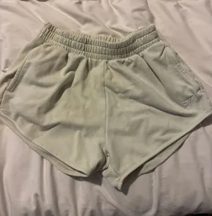 Gymshark pale yellow sweat shorts thumbnail 1