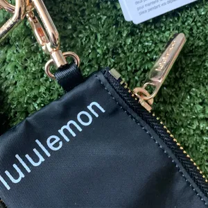 Lululemon Black Gold dual Pouch wristlet thumbnail 3