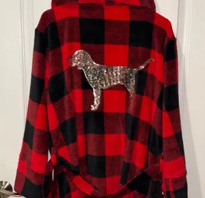 red and black buffalo plaid plush hooded robe from Victoria's Secret PINK featuring a large silver sequin dog logo on the back thumbnail 1