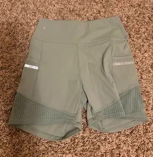 Halara Athletic Shorts Small Pale Green Biker Style Tight Fitted Nylon Blend thumbnail 1