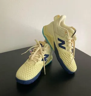 New Balance Coco CG1 Tennis Shoes Yellow Blue WCHCOCI2 NWT thumbnail 1