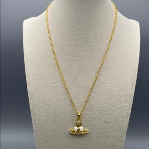 Vivienne Westwood Gold and White Necklace thumbnail 6