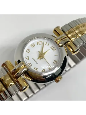 Women’s quartz analog watch silver gold tone 23mm stretch band running thumbnail 3