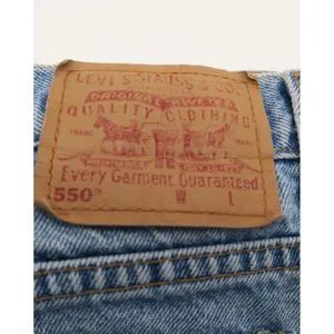 Vintage Levis 550 Relaxed Fit Denim Cut Off Shorts MedWash Blue Frayed Hem 16MIS thumbnail 2