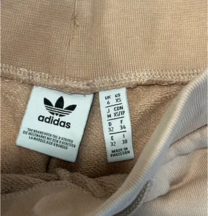 Adidas cream and orange joggers thumbnail 3
