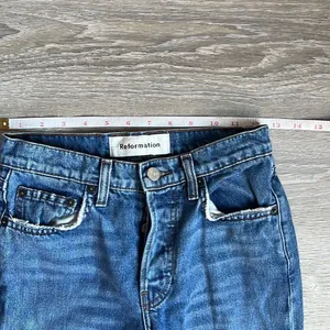 reformation mid crop flare jeans baltic thumbnail 6
