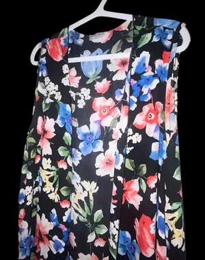 Sleeveless cover-up for spring and summer double side splits. Layering piece. thumbnail 1