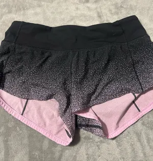 Pink and black Lululemon shorts   thumbnail 1