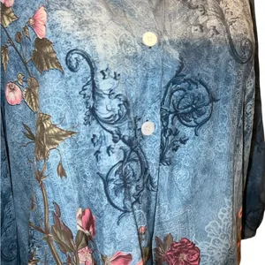Blue faded look top with floral design. thumbnail 9