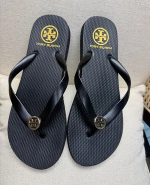 Tory Burch Black Flip Flips thumbnail 1