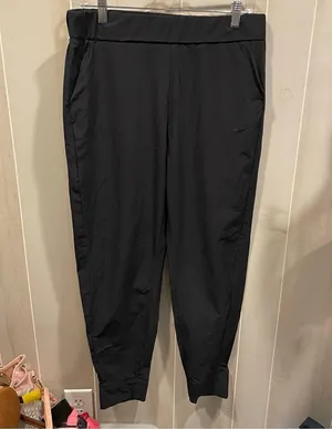 Cozy relaxed Nike dri-fit lightweight pants joggers pockets tapered leg pull on thumbnail 1