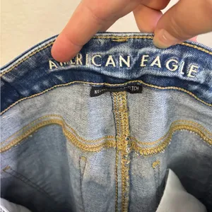 American Eagle Outfitters Distressed Ripped Blue Skinny Jeans Size 0 thumbnail 7