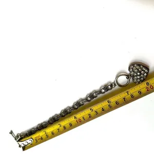 Silver tone bracelet with rhinestone heart charm thumbnail 6