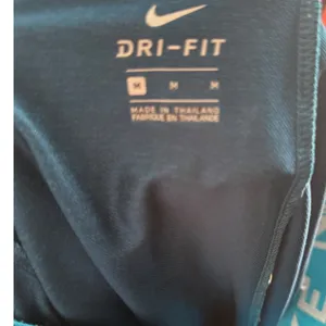 Nike Dri-FIT Womens Teal Heathered Athletic Shorts Medium Drawstring Pockets thumbnail 8