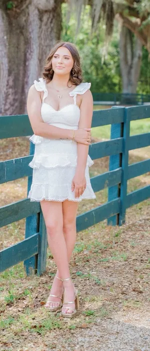 White lace dress with ruffled sleeves and hem thumbnail 1
