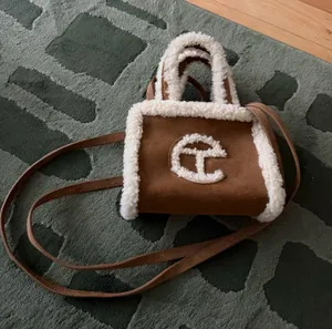 UGG x Telfar Shearling-Trim Mini Crossbody Bag thumbnail 1